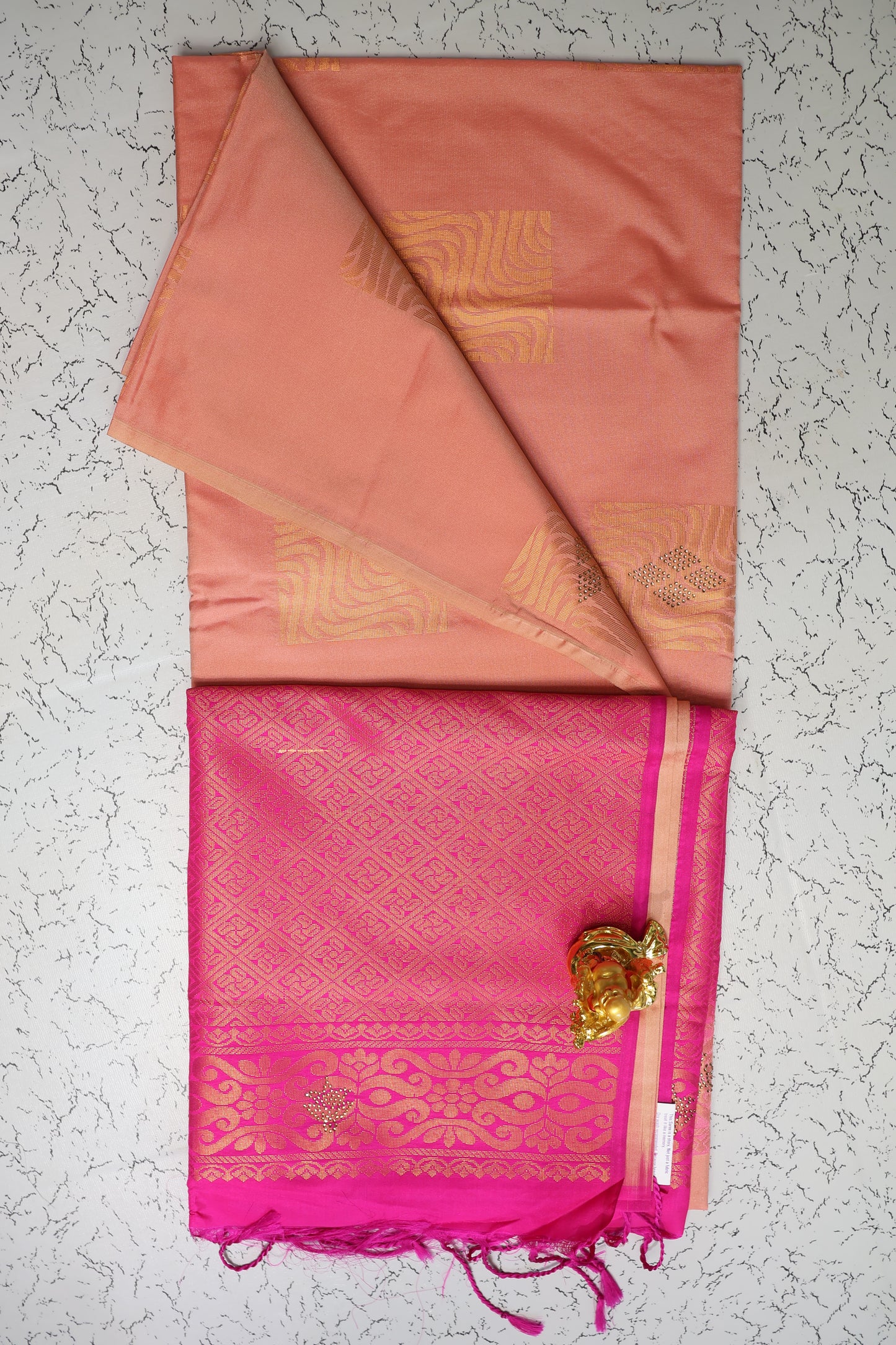 Festive wear stone work Peach saree with Rani pink pallu without border