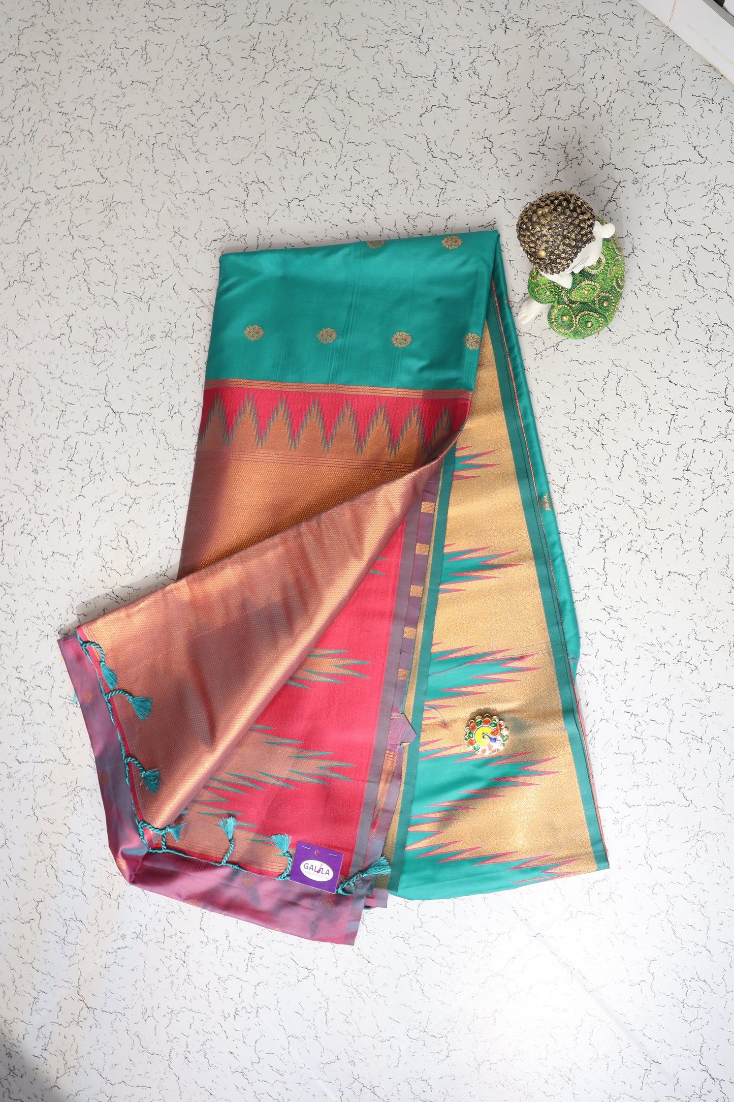 Traditional wear temple border green and Rani pink semi silk saree