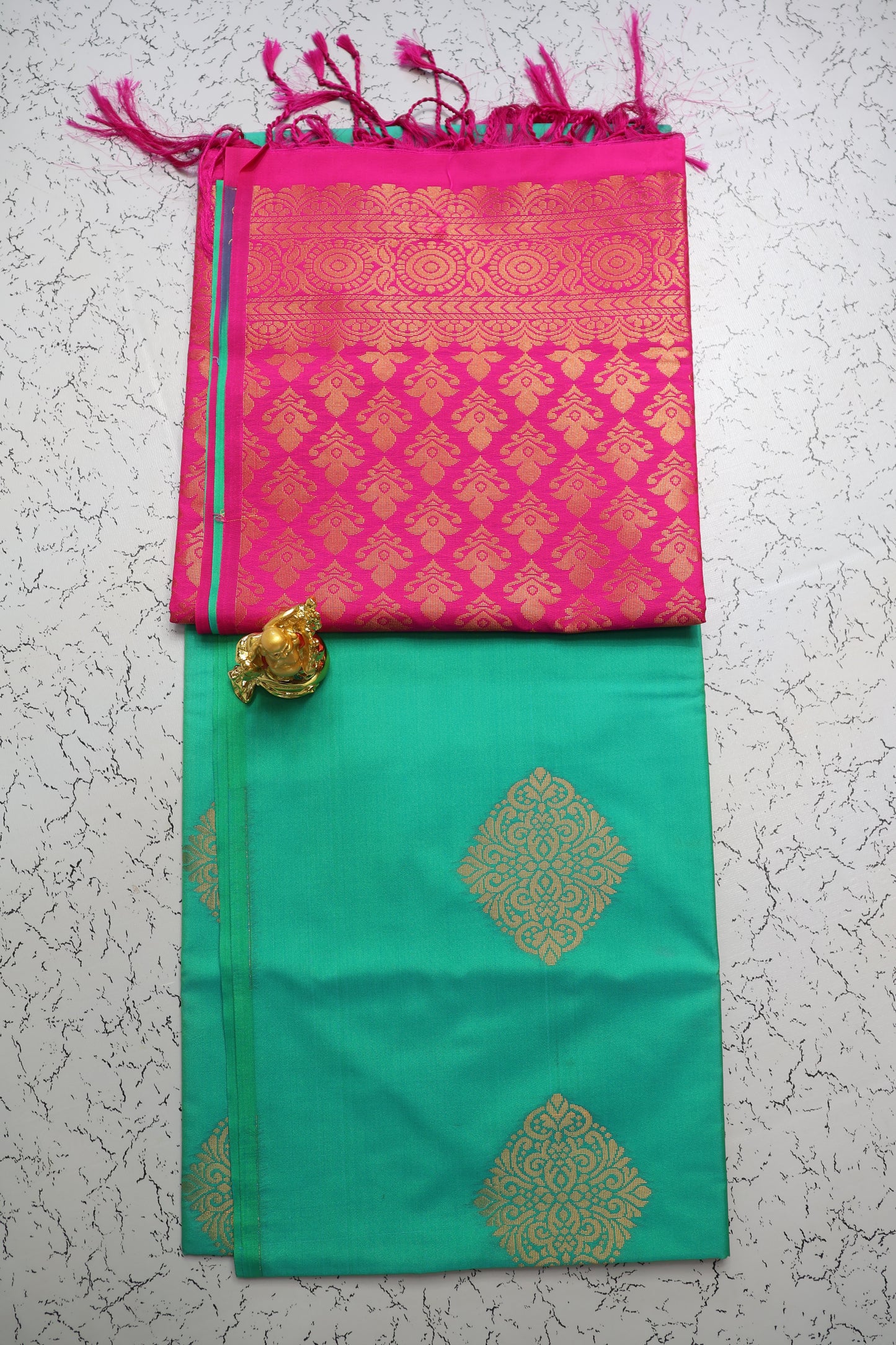 Wedding and traditional gold zari pattern green saree with Rani pink pallu