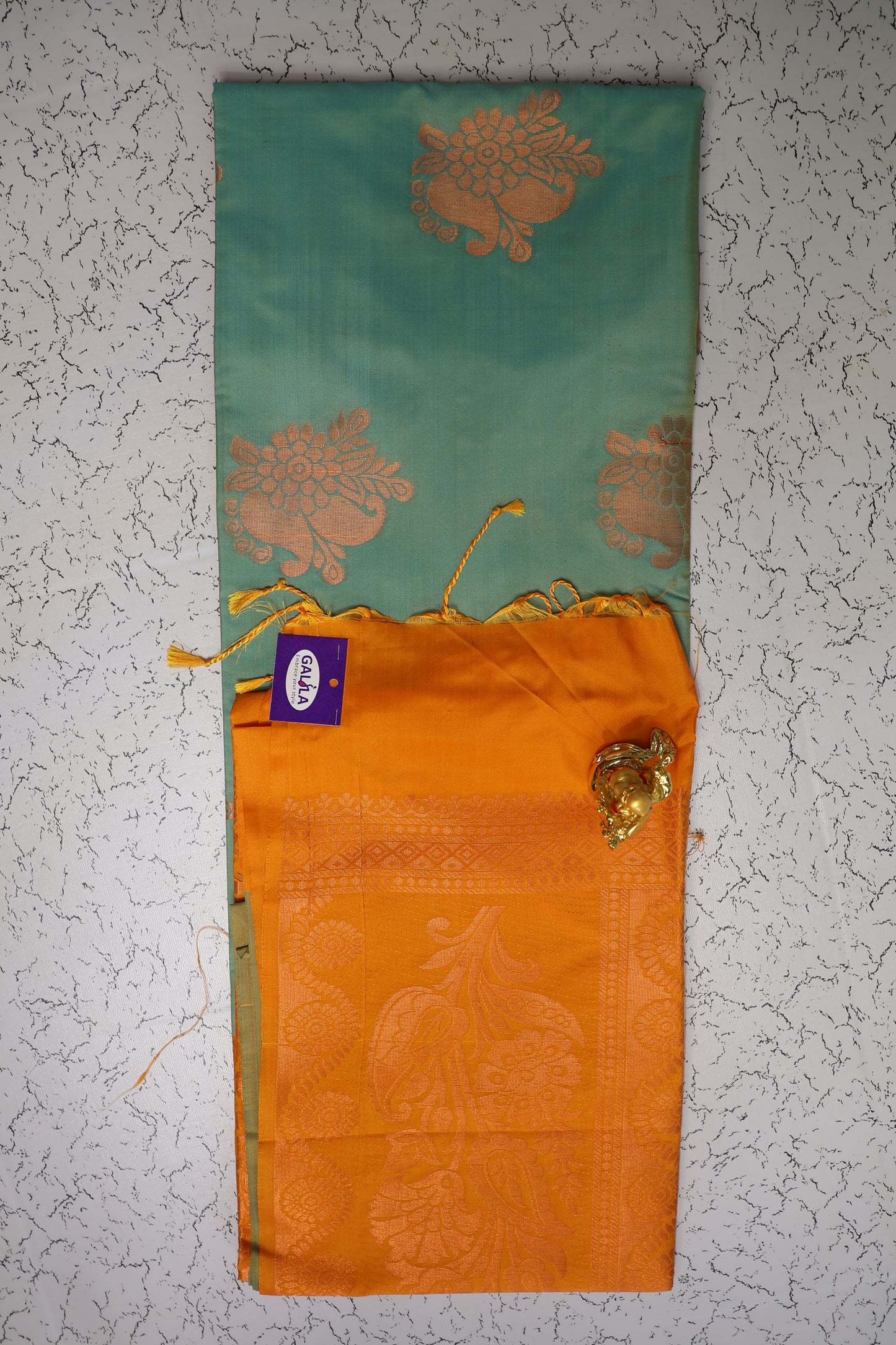 Wedding wear Sea green soft silk saree with gold zari border orange pallu without border