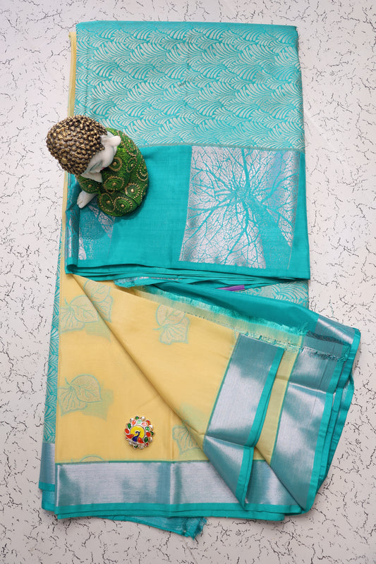 Festive wear pastel shades Beige and Bluish green semi silk saree