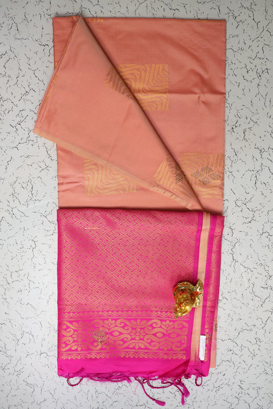 Festive wear stone work Peach saree with Rani pink pallu without border 