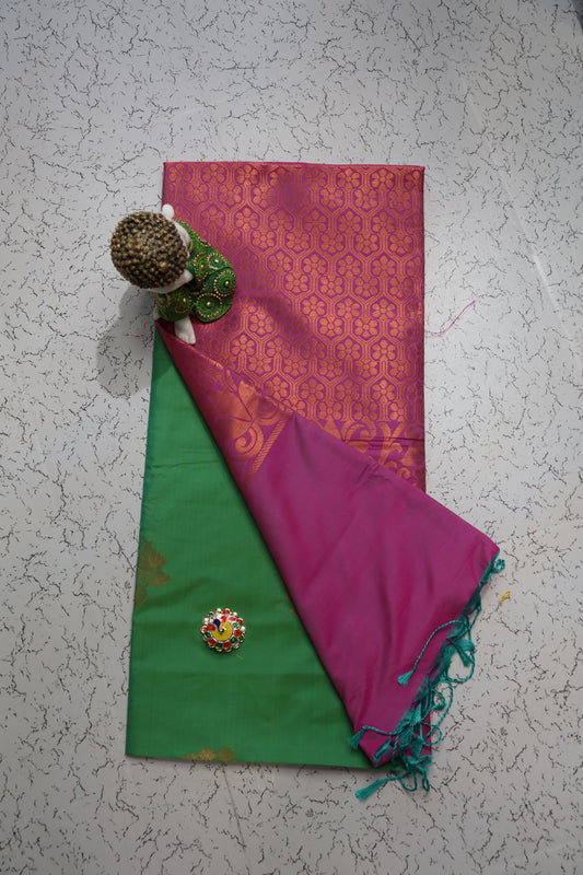 Traditional and wedding wear green and pink soft silk saree