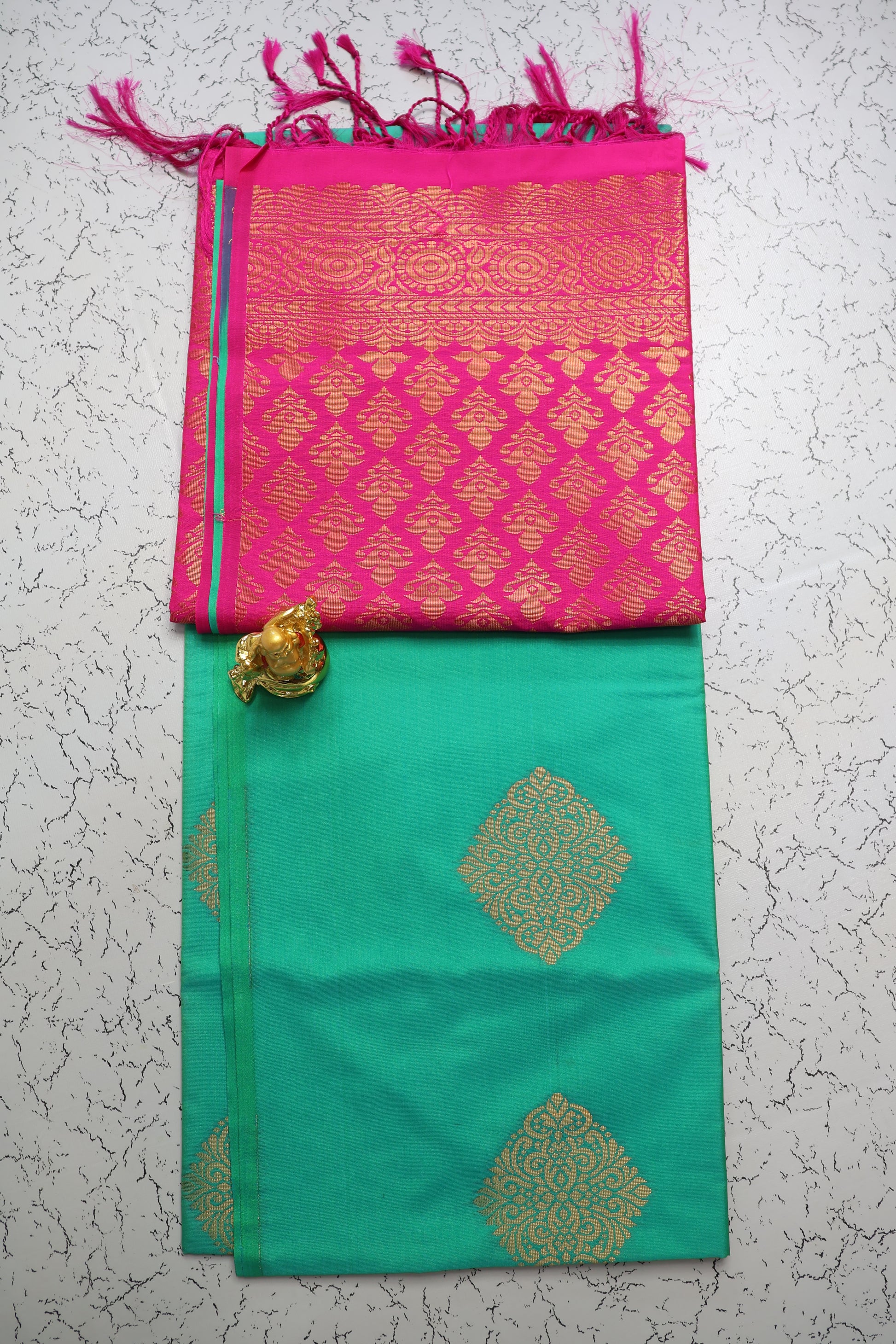 Wedding and traditional gold zari pattern green saree with Rani pink pallu